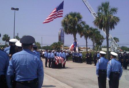 Honor Guard prepares to fold flag of Officer Henry Canales